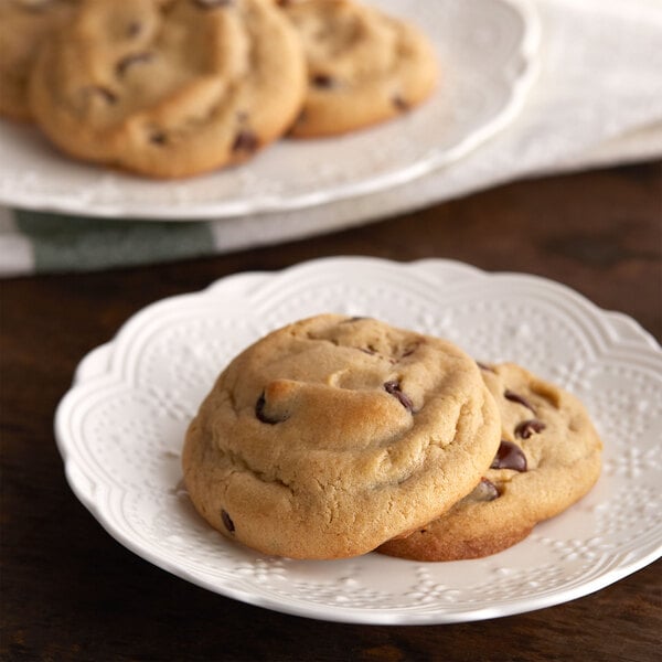 Preformed gluten-free chocolate chip cookies from David's Cookies on a white plate.