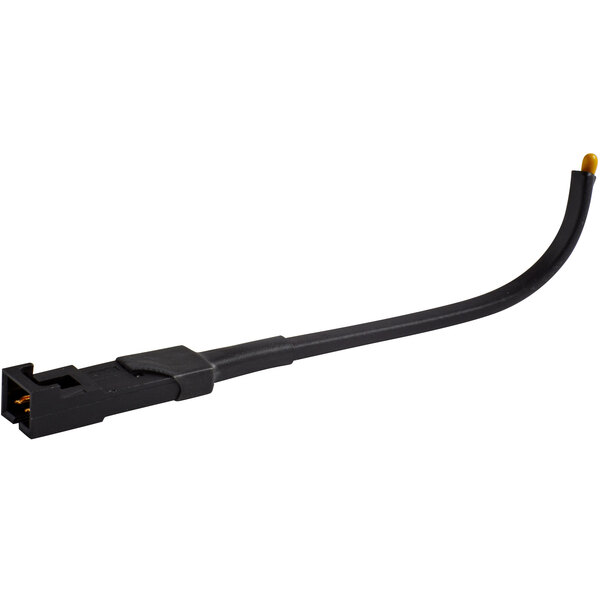 A black electrical wire with yellow connectors on it.