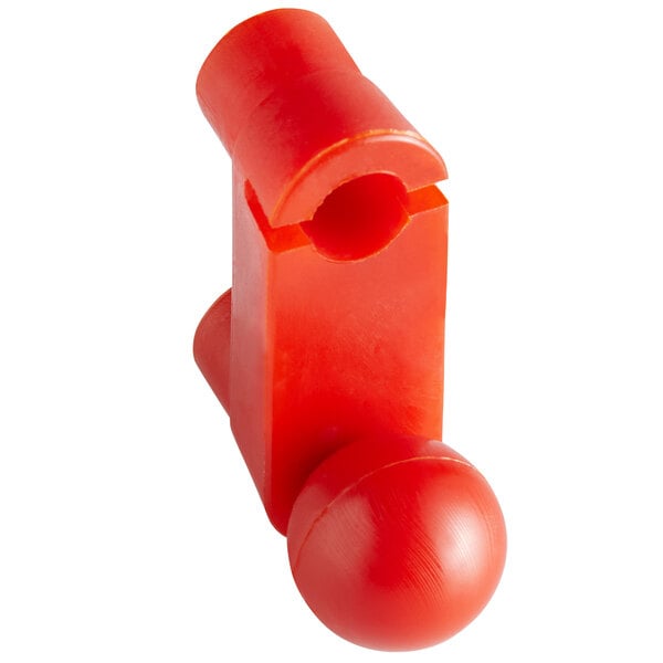 A red plastic handle with a ball on the end.