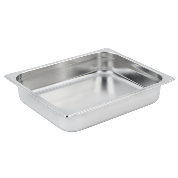 A Bon Chef stainless steel food pan on a silver tray.