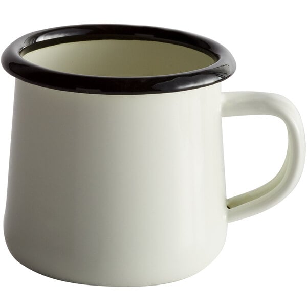A white enamelware mug with a black rim.