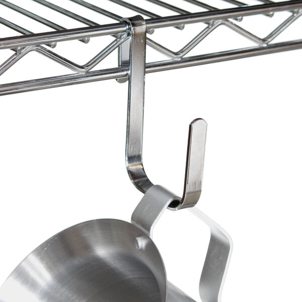 A chrome Metro snap-on hook holding a metal bowl.