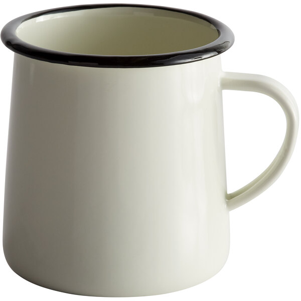 A Tablecraft enamelware mug with a white body and black rim.