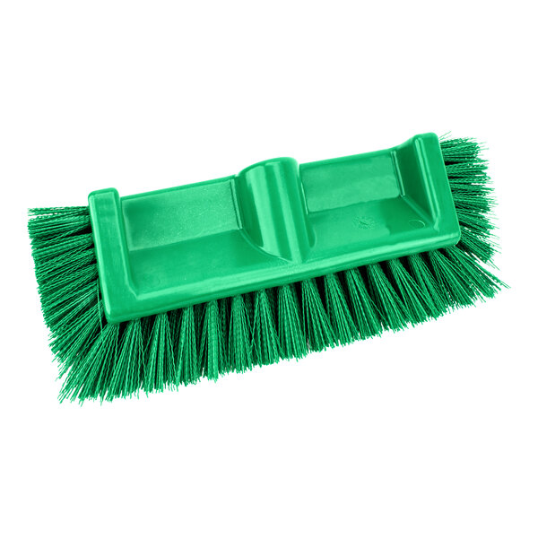 A close-up of a Carlisle green floor scrub brush with end bristles.