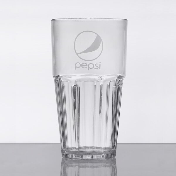 A close-up of a clear plastic tumbler with the Pepsi logo.