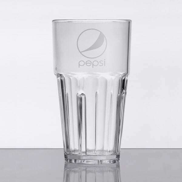 A close up of a clear plastic tumbler with the Pepsi logo on it.