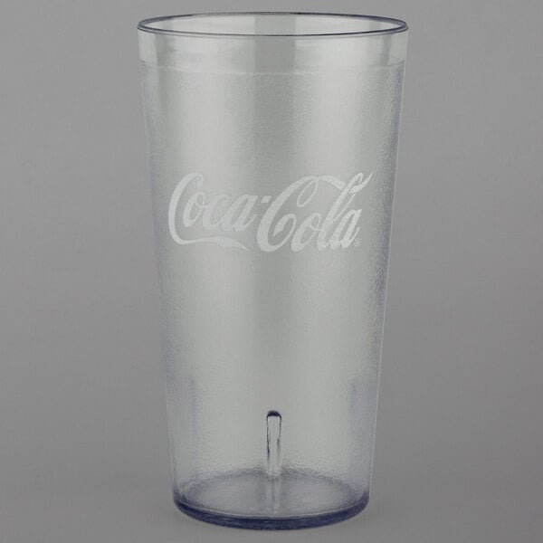 A clear plastic GET tall tumbler with the Coca-Cola logo in pebbled plastic.