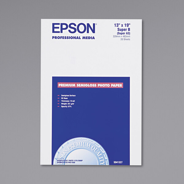 A white package of Epson Premium Semi-Gloss Photo Paper with blue and red text and a blue circle.