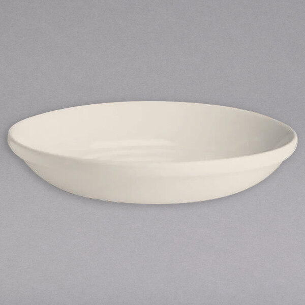 A white Hall China serving bowl.