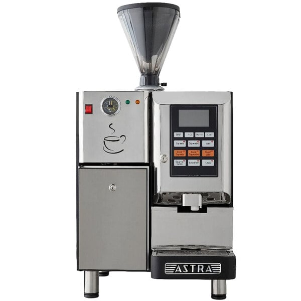 An Astra Super Mega automatic coffee machine with a black and silver finish and a cup on the screen.