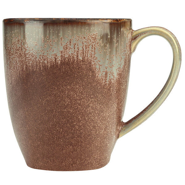 A brown and white Libbey Hedonite porcelain mug with a handle.