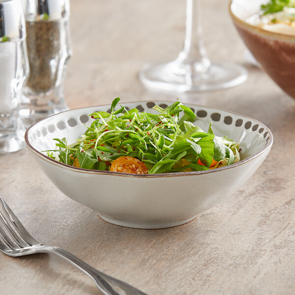 A close-up of a Libbey Dulcet stoneware bowl filled with salad.