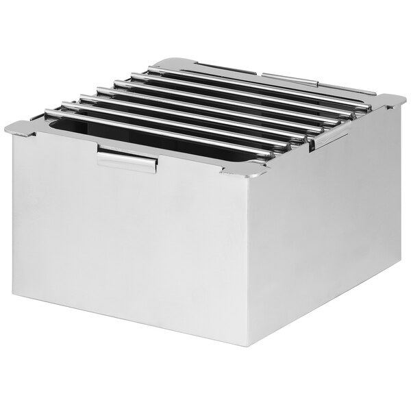 An Eastern Tabletop solid stainless steel cube with a metal grate.