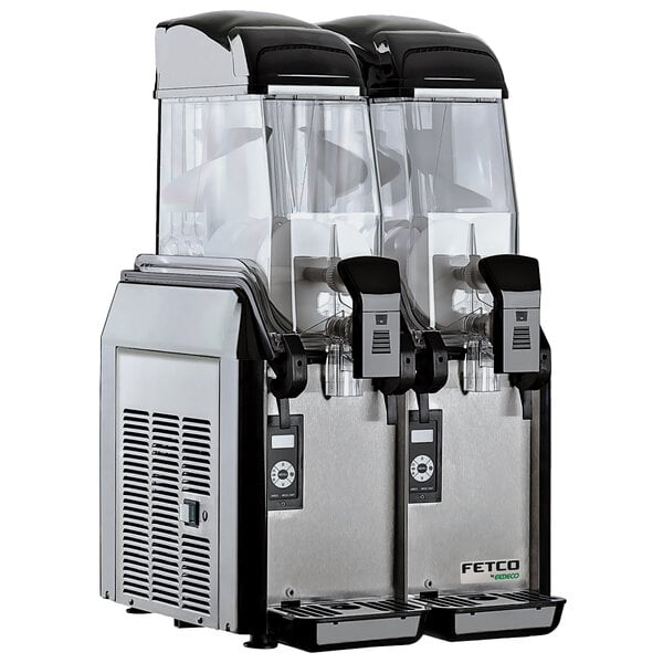A Fetco by Elmeco frozen beverage machine with two clear containers on top.
