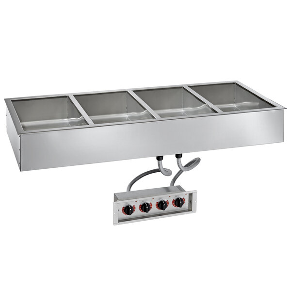 An open stainless steel Alto-Shaam drop-in hot food well with three compartments on a counter.