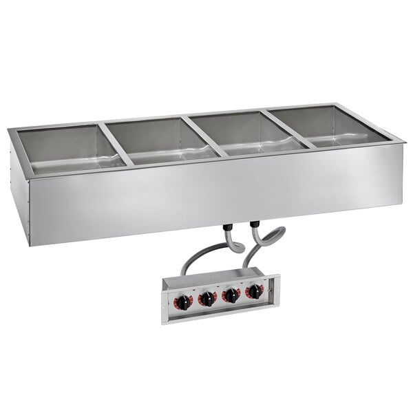 An Alto-Shaam drop-in hot food well with four compartments for 6" deep pans.