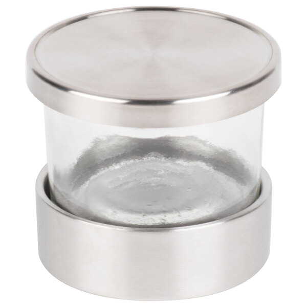 A glass Cal-Mil Luxe jar with a metal lid.