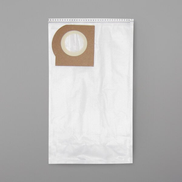 A white vacuum bag with a brown circular label with a white circle inside.