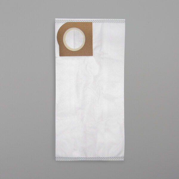 A brown paper vacuum bag with a white circle.