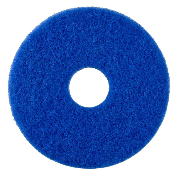 A blue Scrubble 53-13 floor pad with a hole in the middle.