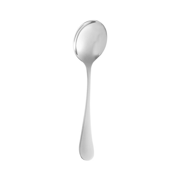 A silver soup spoon with a white handle.