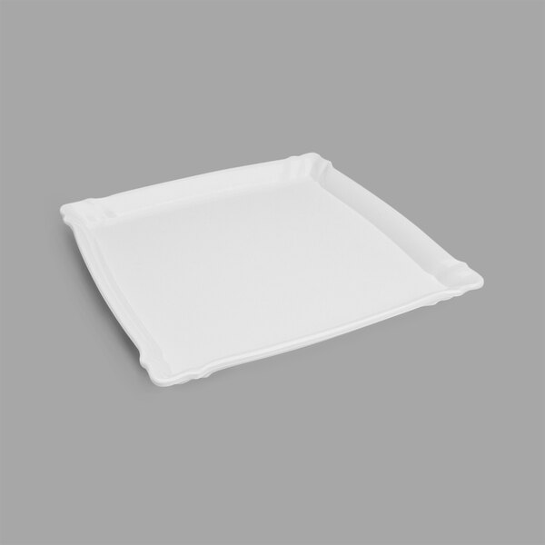 A white square tray with a handle.