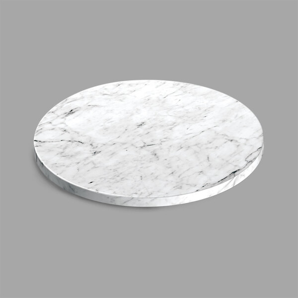 A white faux Carrara marble round serving board.