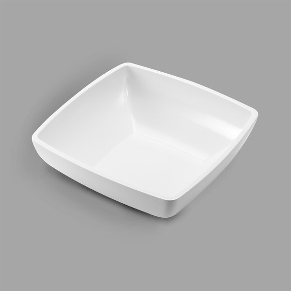 A white square Delfin melamine bowl.