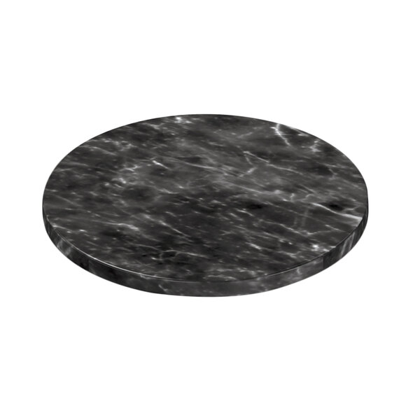 A black marbled surface with white veins.