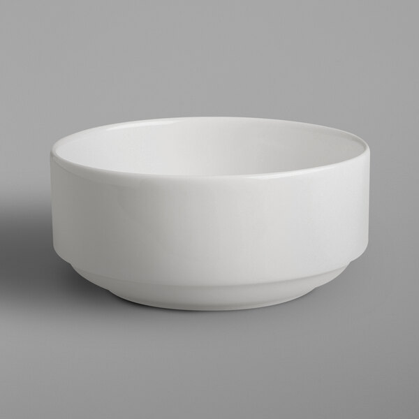 A RAK Porcelain ivory bowl on a gray surface.