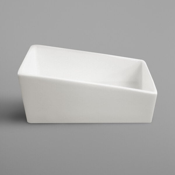A white rectangular RAK Porcelain sugar packet holder with a small opening.