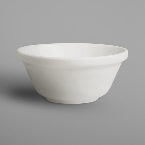 A RAK Porcelain ivory stackable bowl on a white background.