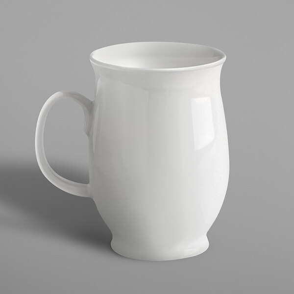 A white RAK Porcelain mug with a handle.