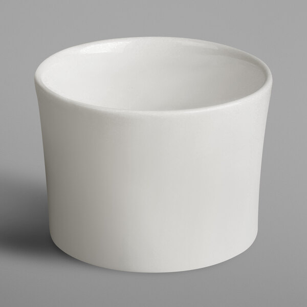 A white RAK Porcelain breakfast cup without a handle on a white background.
