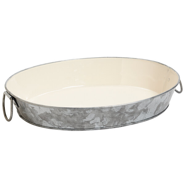 A GET oval galvanized metal tray with handles.