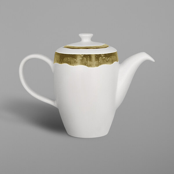 A white porcelain teapot with gold trim.