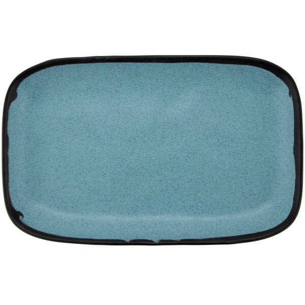 A rectangular matte speckled grayish blue melamine platter with a black border.