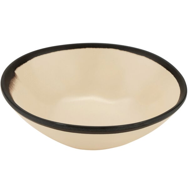 A white bowl with a black rim.