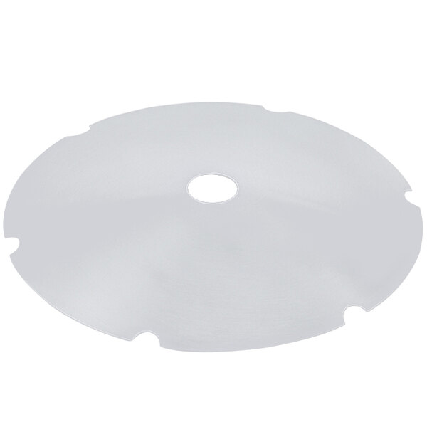 A white circular false bottom with a hole in it.