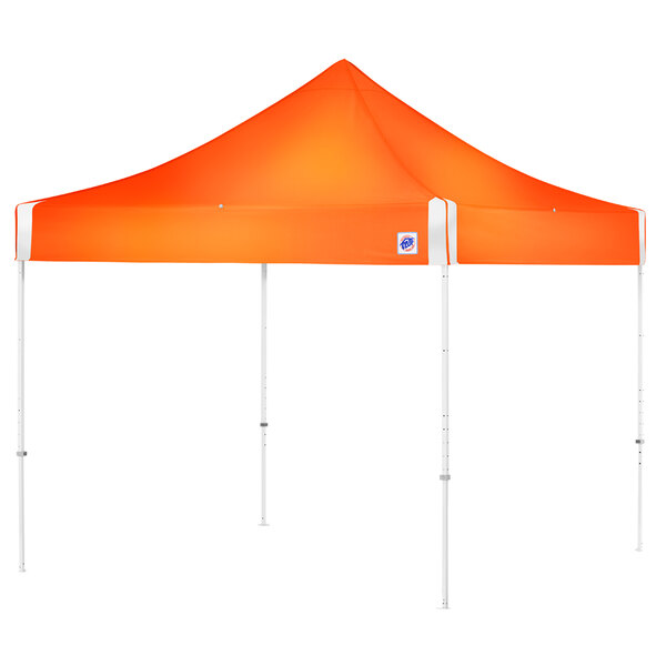 An orange E-Z Up canopy with white poles.