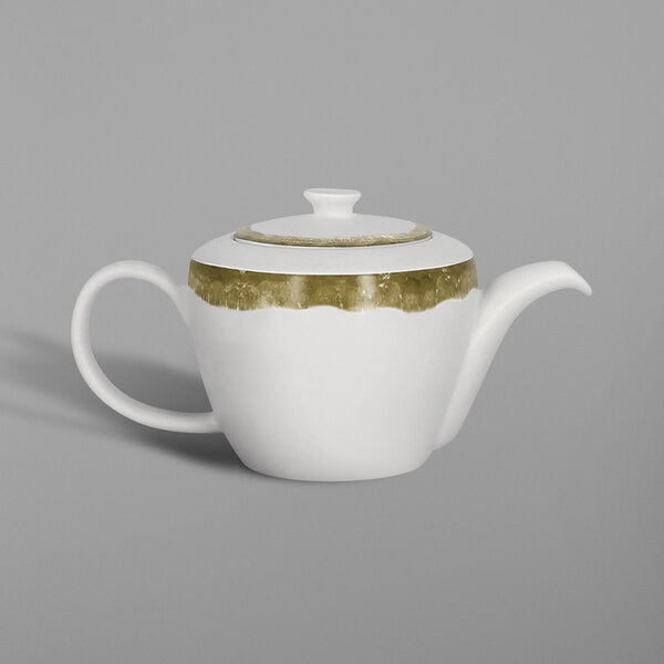 A white porcelain teapot with gold trim.