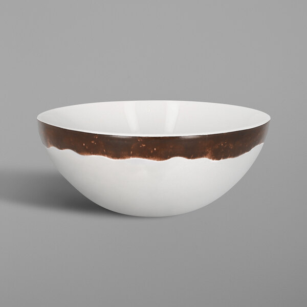 A white porcelain bowl with brown oak stripes on the rim.
