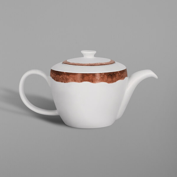 A white porcelain teapot with walnut brown trim.
