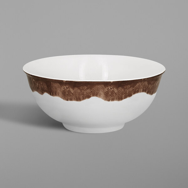 A white bowl with a brown band around the rim.