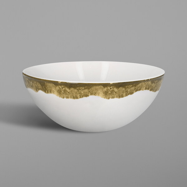 A white porcelain bowl with moss green accents.