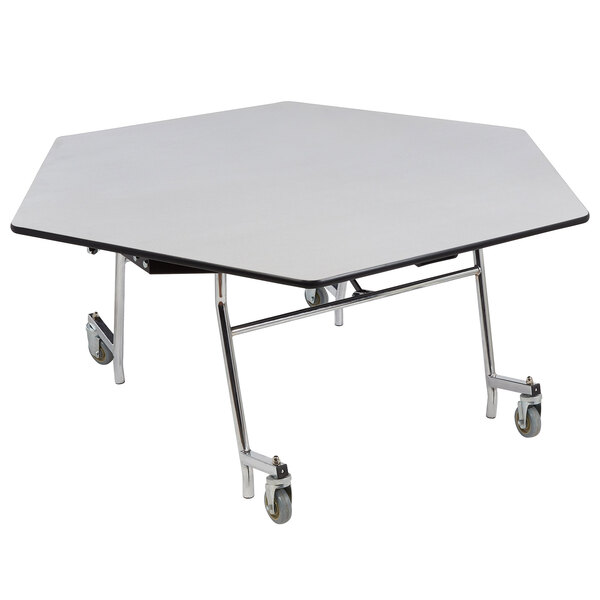 A white hexagonal table top with metal legs.