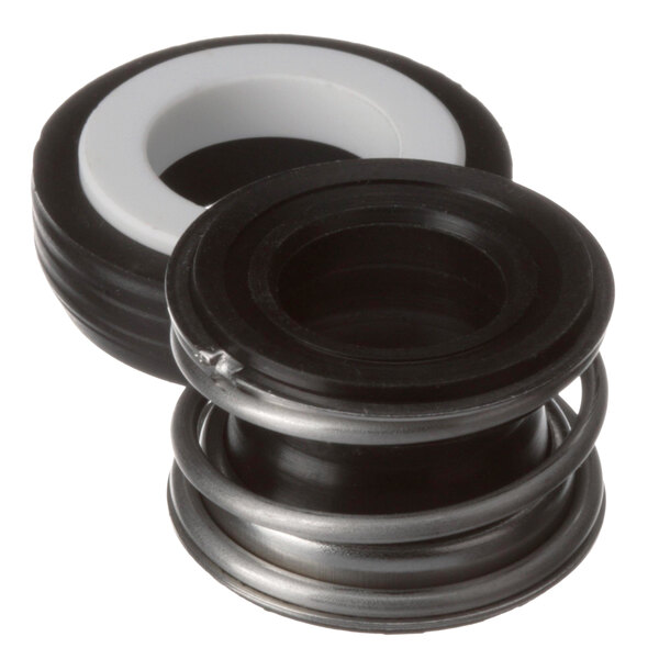 A white and black rubber seal with a white ring and a metal spring.