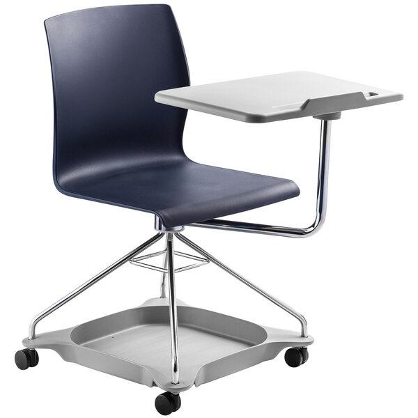 A blue and grey school desk chair with a tablet tray on it.