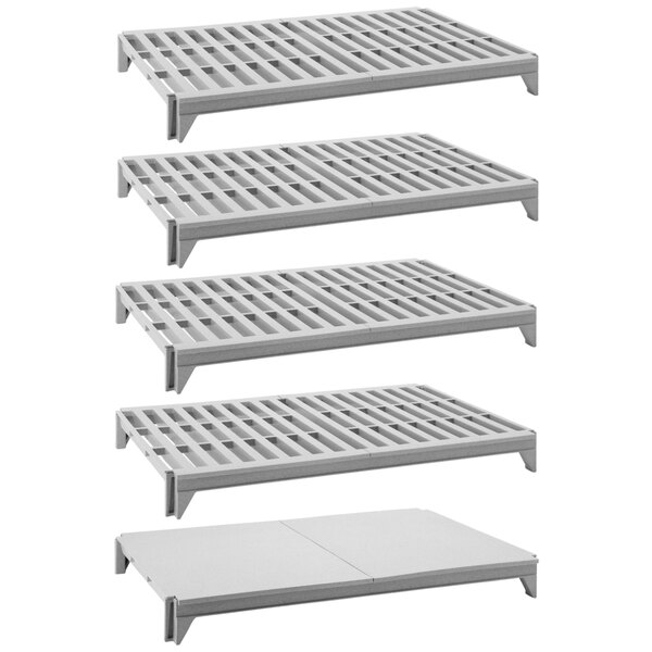 A white rectangular Cambro Camshelving kit with 4 vented and 1 solid white plastic shelves.