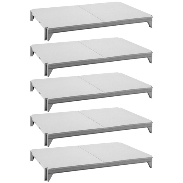 A white Cambro Camshelving stationary shelf kit with 5 shelves.